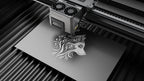 Aliencell X1 Diode Laser Engraver with air assist engraving detailed lion design on white material