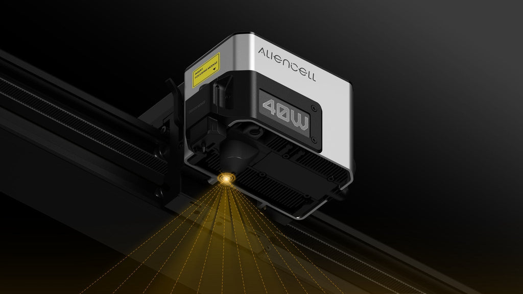 Aliencell X1 40W diode laser engraver mounted on rail with air assist, showing beam pattern from above