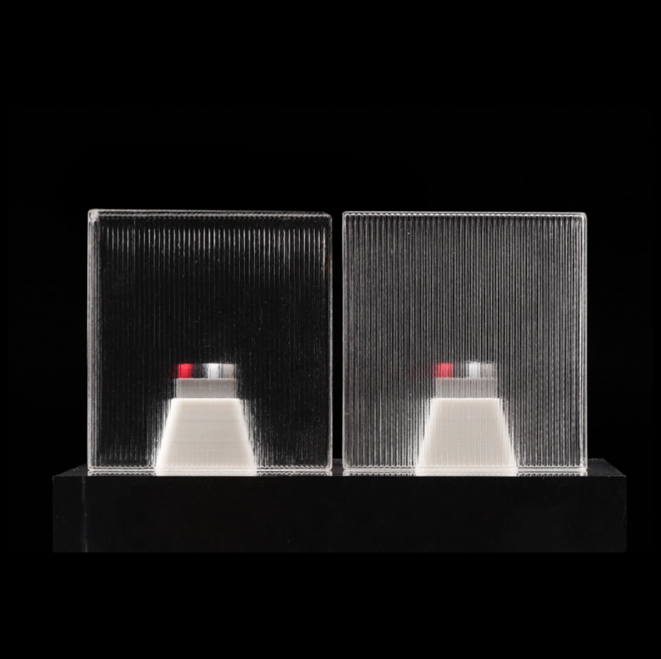Bambu Lab PETG Translucent filament spools displayed side by side showing clear ribbed packaging with white base and red/s...