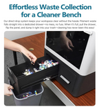 BIQU Panda Den Air waste collection drawer pulls out to reveal filament scraps, keeping 3D printer workspace clean and org...